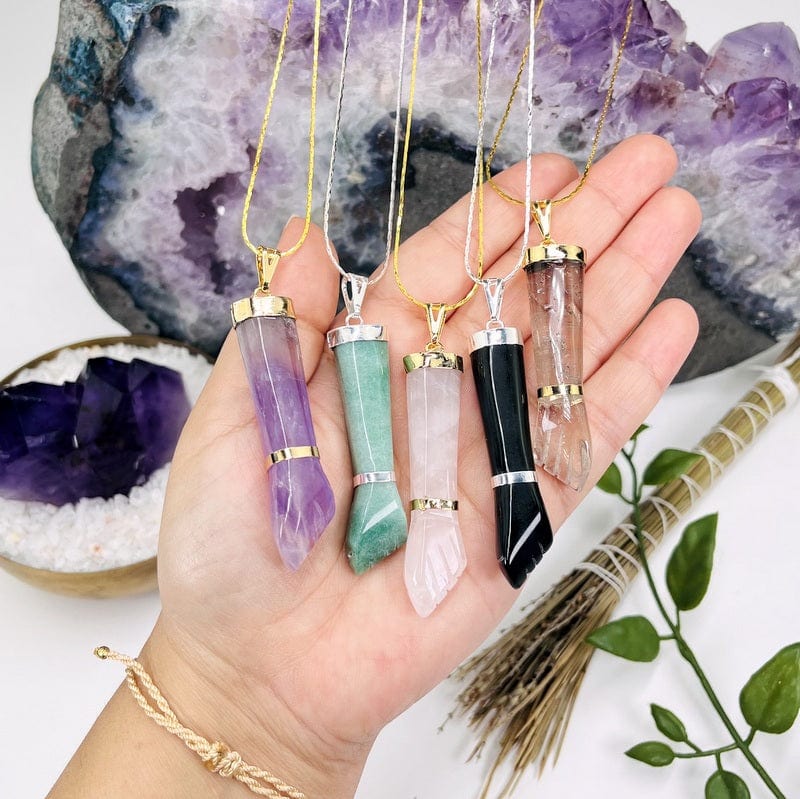figa hand pendants displayed on necklace chain