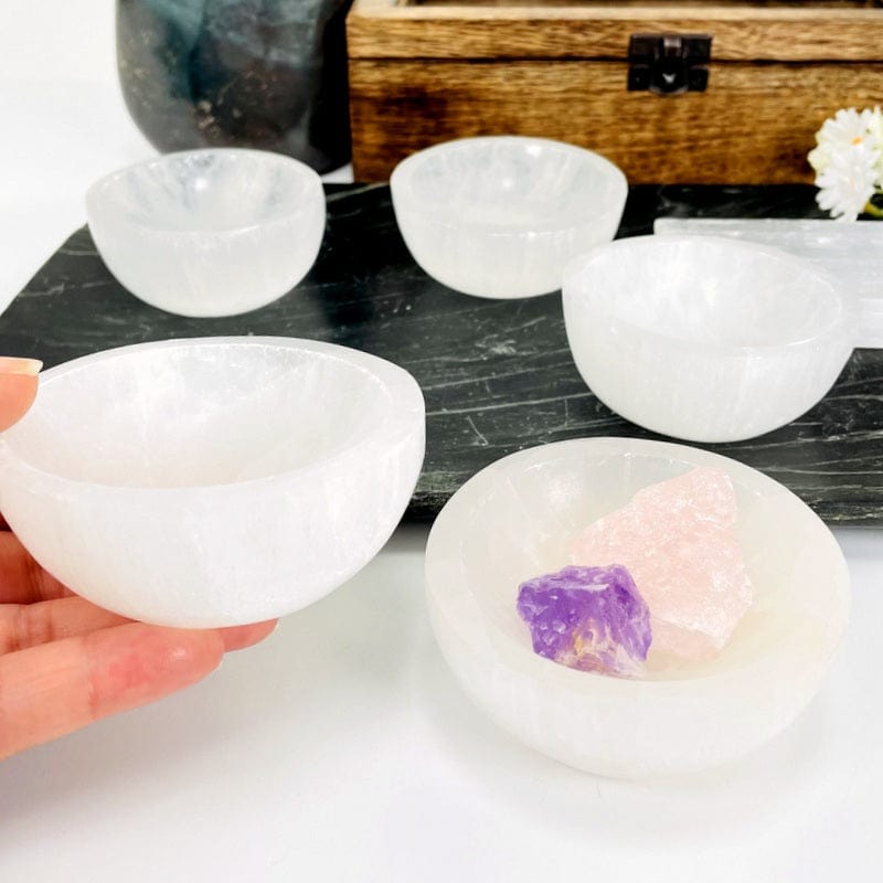 side shot of the selenite bowls showing depth 