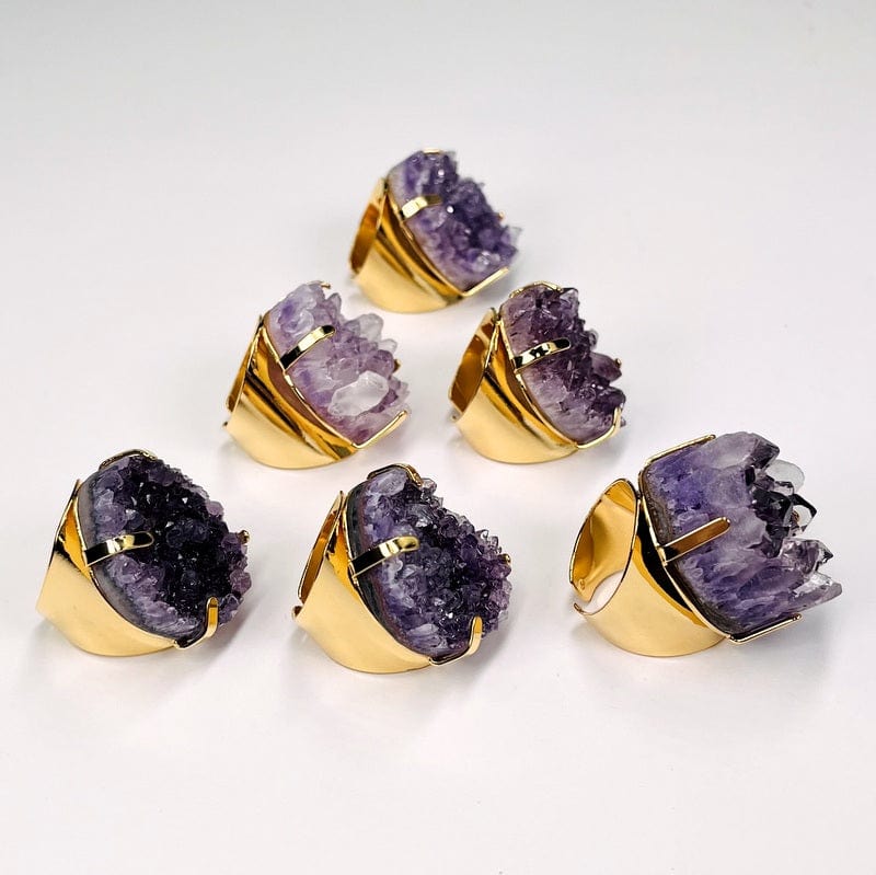 side view of the cluster rings. they come on an adjustable rings band 