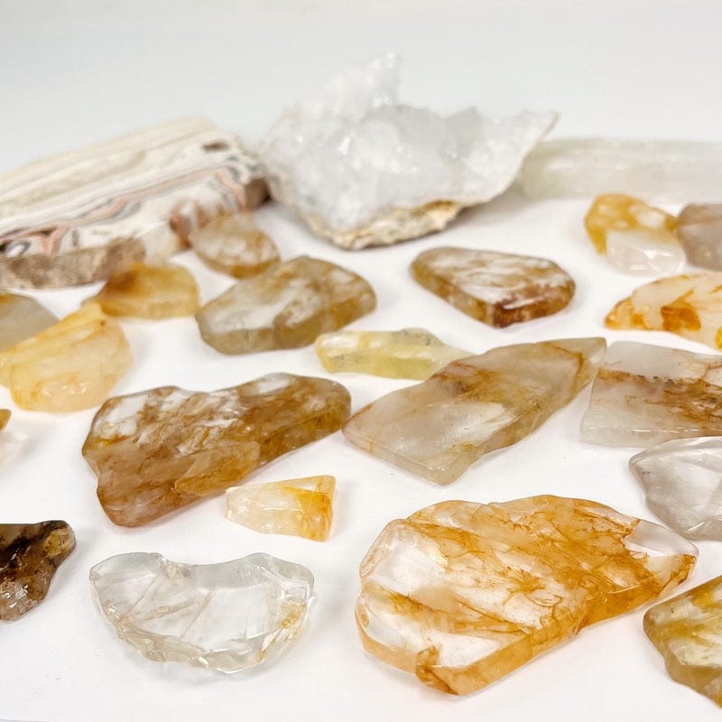 side shot of the golden healer stone semi polished slabs displaying the different thicknesses 