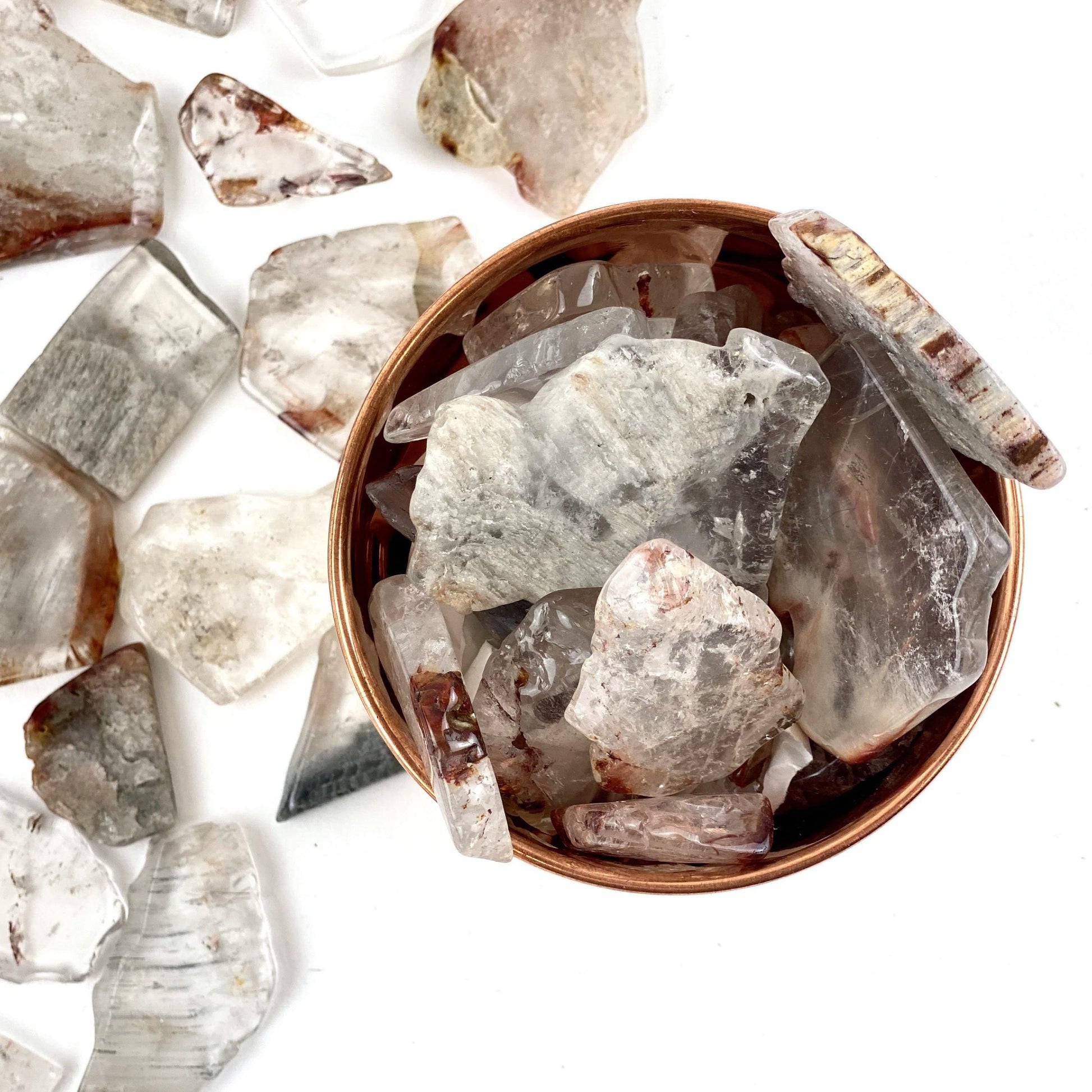 Top view 1/2 Lb Amphibolite Quartz Tumbled Slabs in bowl (bowl not included)