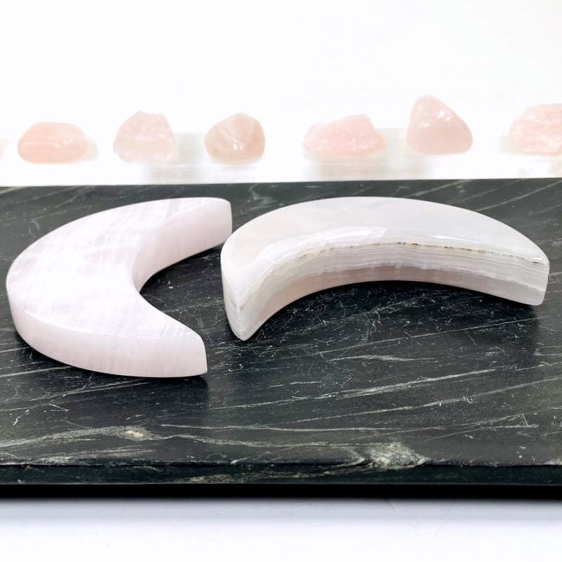 side shot of the pink calcite moons showing the thick cut 