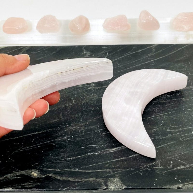 side shot of the pink calcite moons showing the thick cut