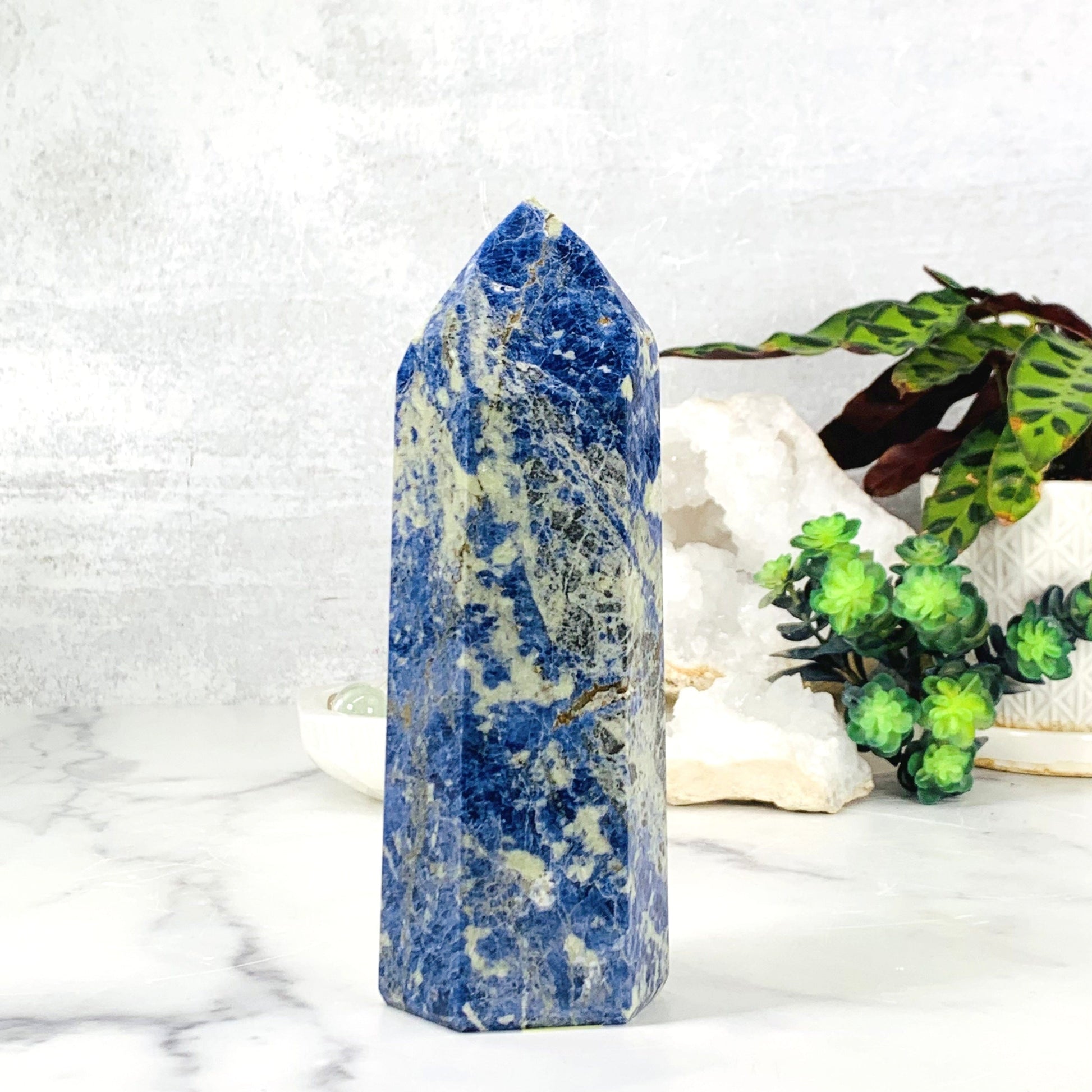 Backside of the Sodalite Polished Tower Point