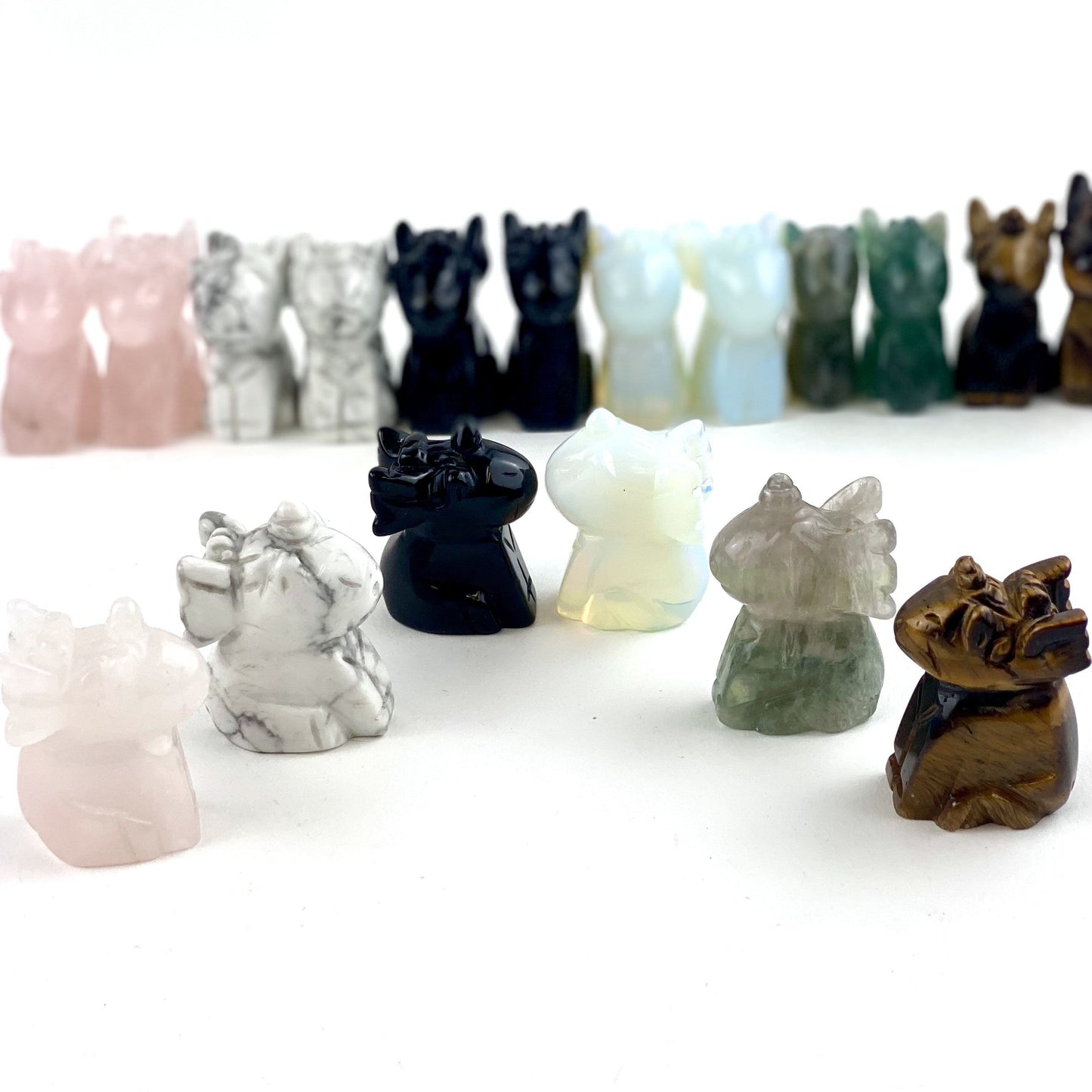 Side view of Gemstone Unicorn Dragon in different stones