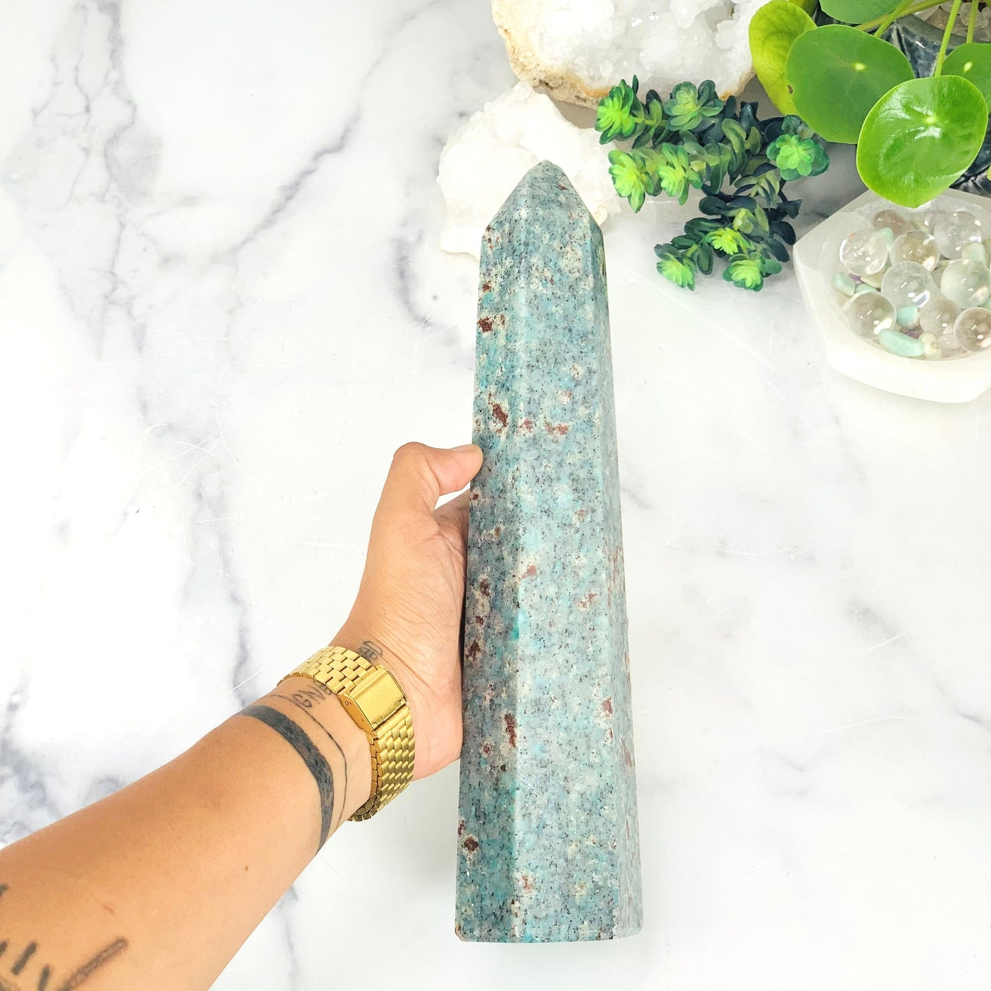 Amazonite Polished Point Tower on hand