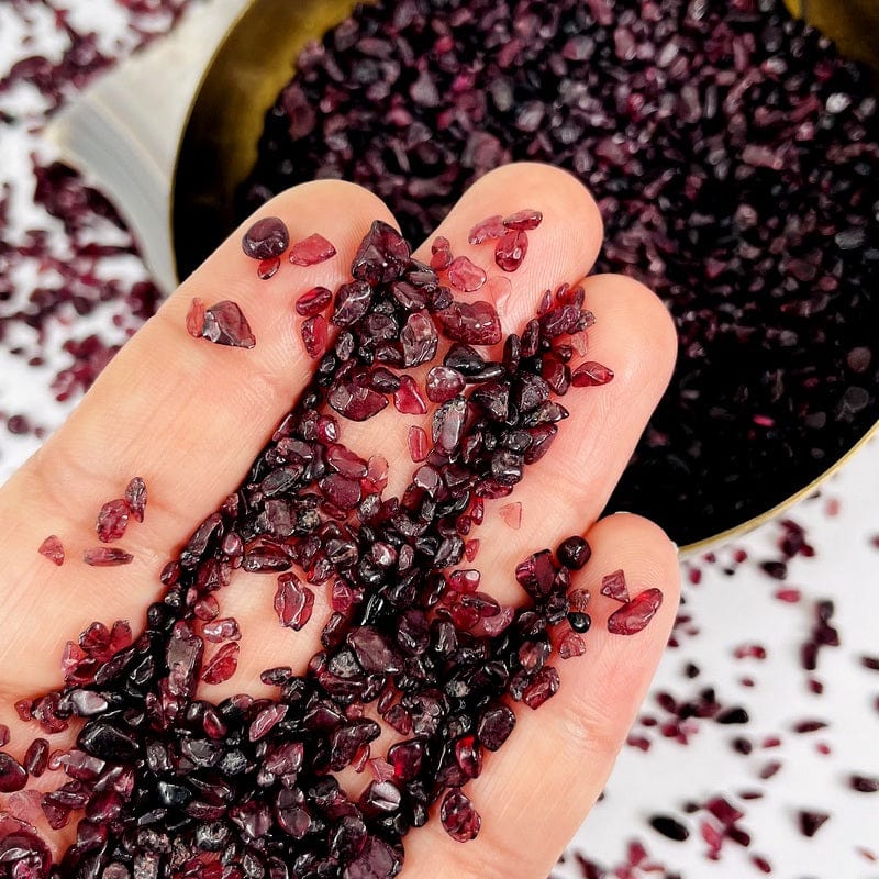 small garnet chips in hand for size reference 
