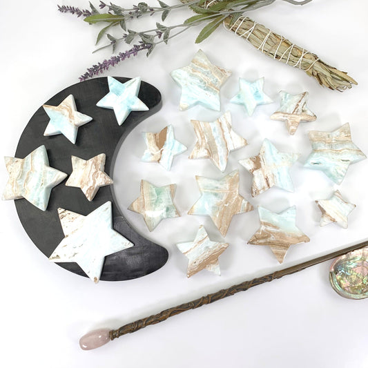 a multitude of stars laid out on a white background