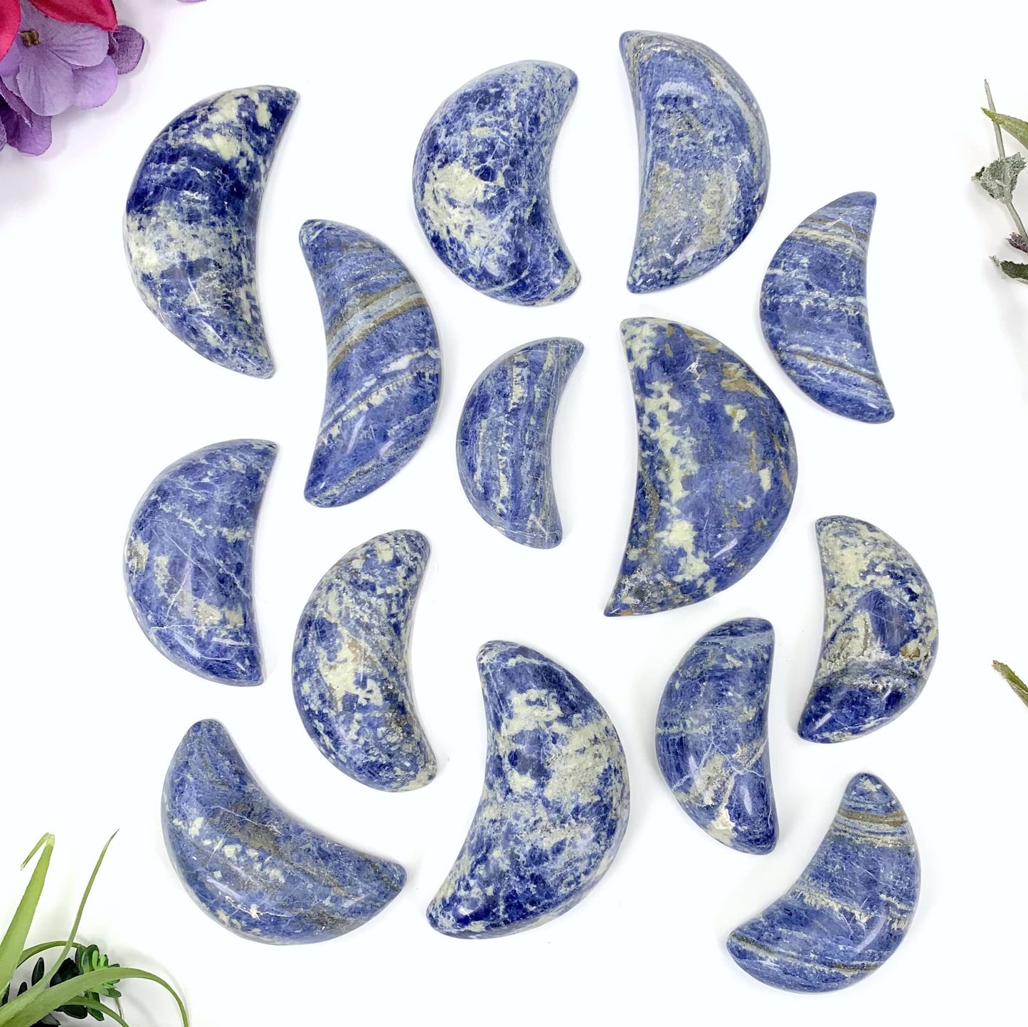 sodalite moons on white background