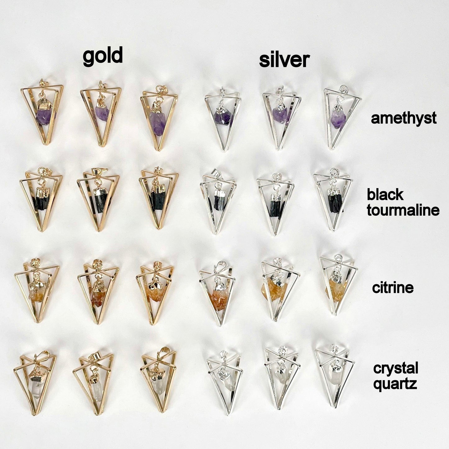 overhead view of three of each dangle stone point pendulum pendant options on white background for possible variations
