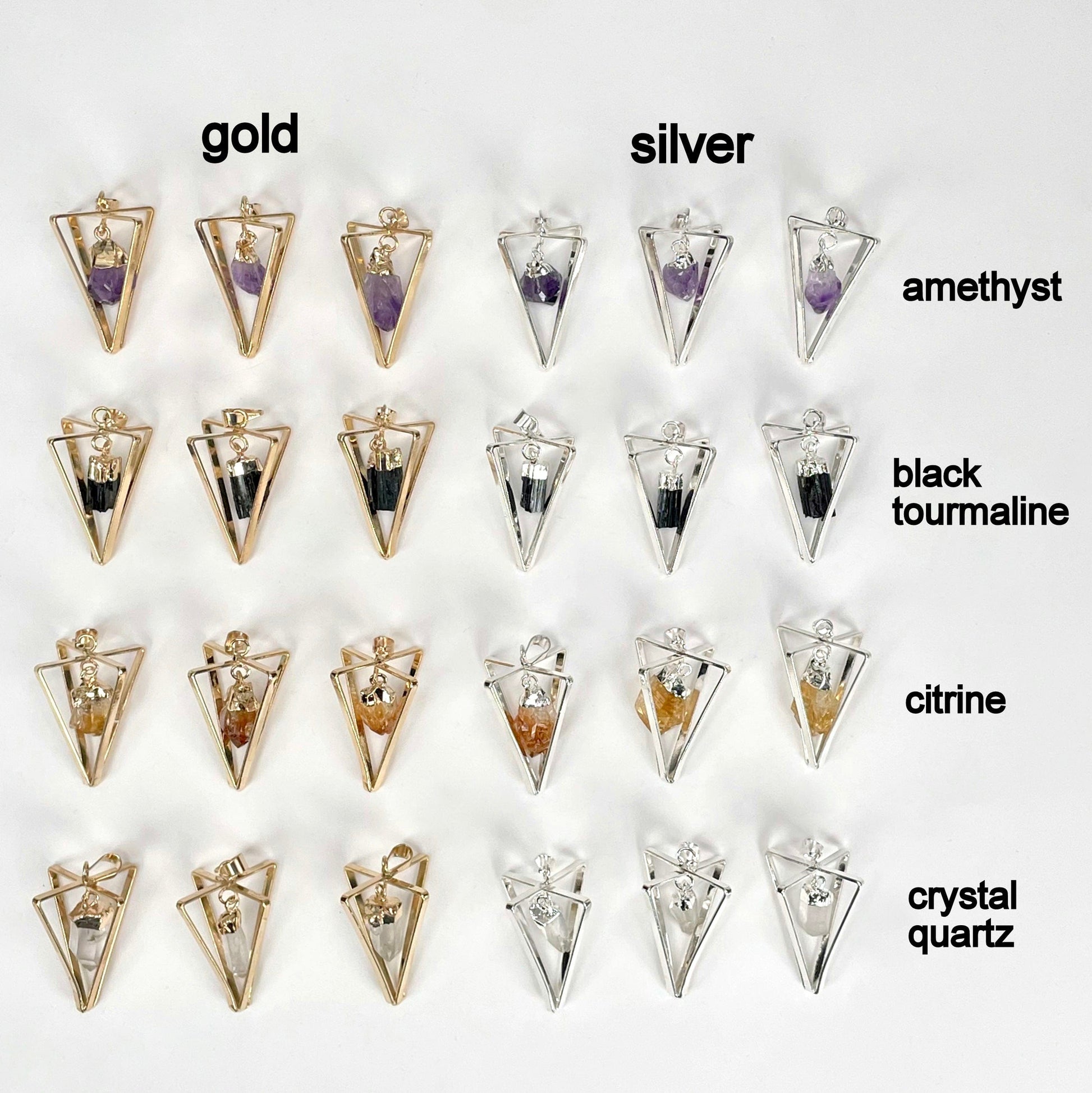 overhead view of three of each dangle stone point pendulum pendant options on white background for possible variations