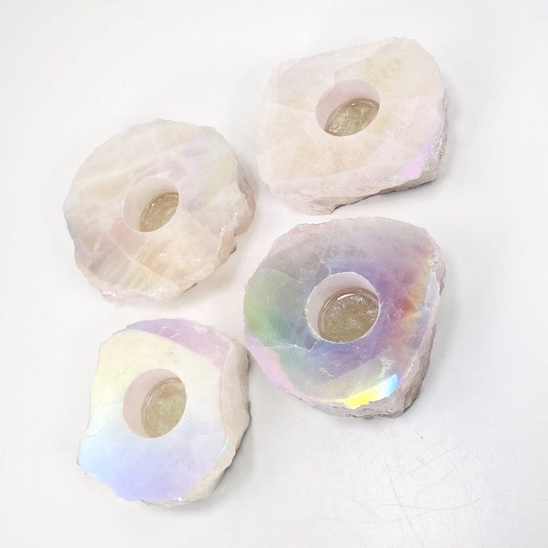 multiple angel aura coated rose quartz candle holders 