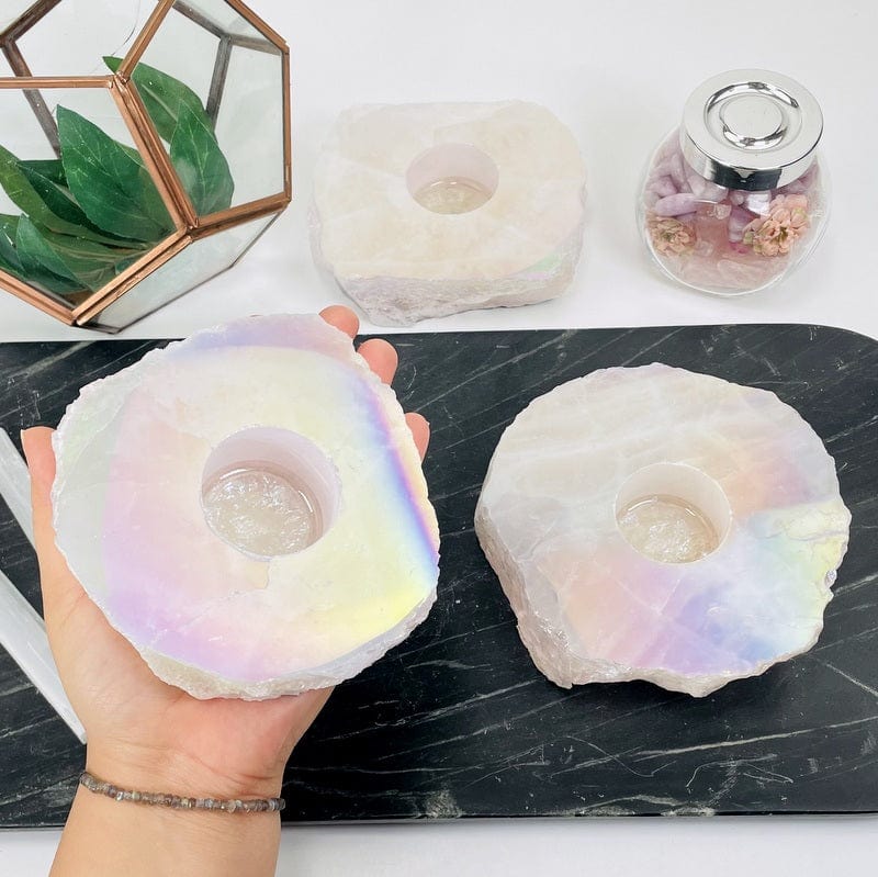angel aura coated rose quartz candle holder showing a rainbow flash