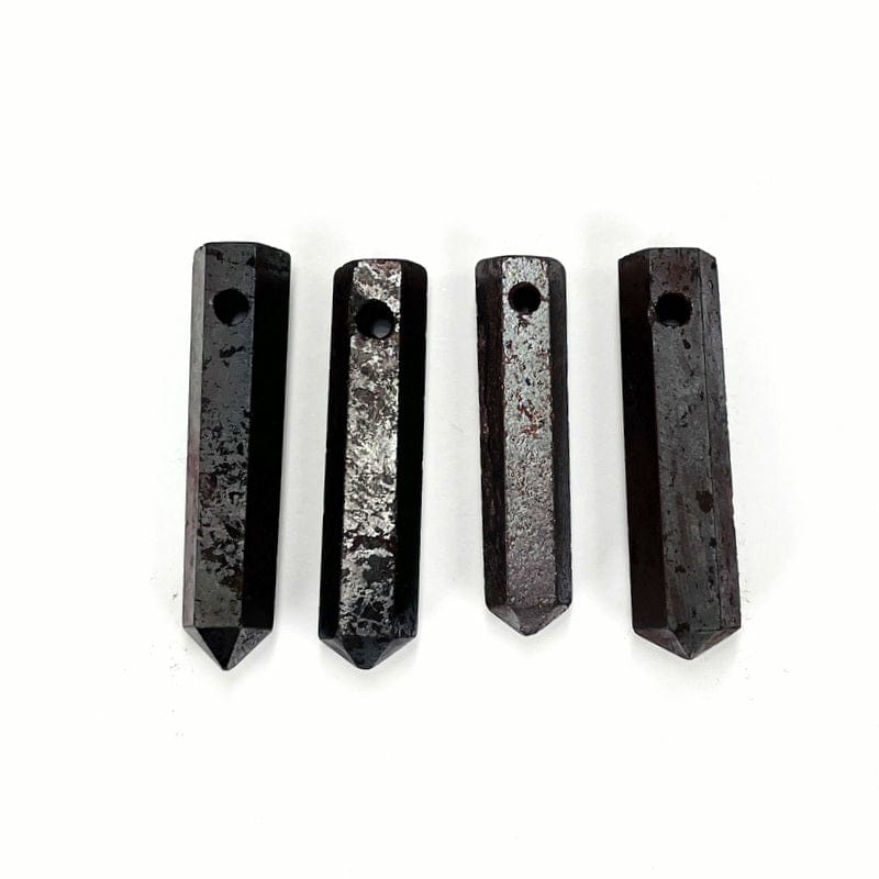 hematite beads next to each other showing the differences in sizes 