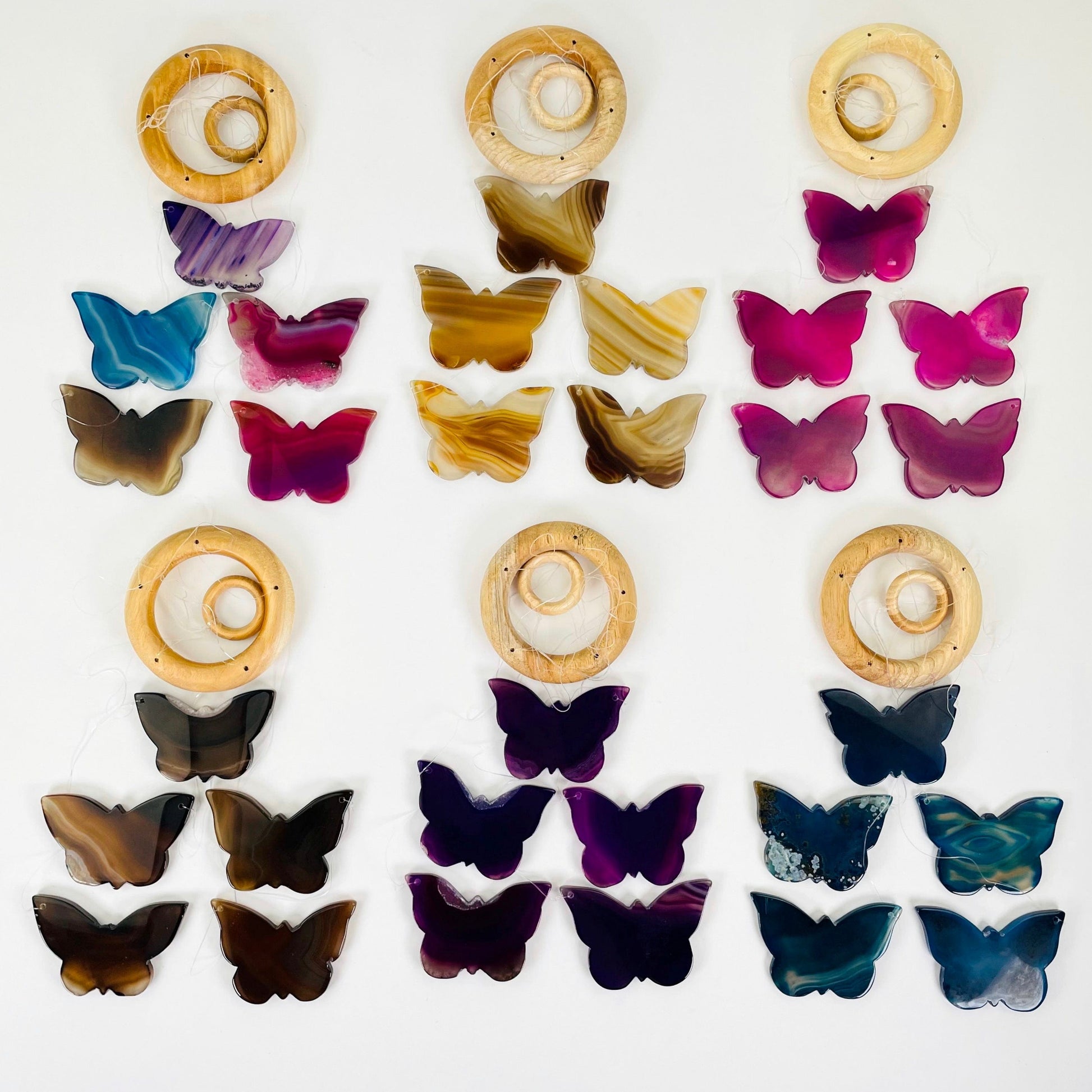 all agate butterfly wind chimes laying flat on white background