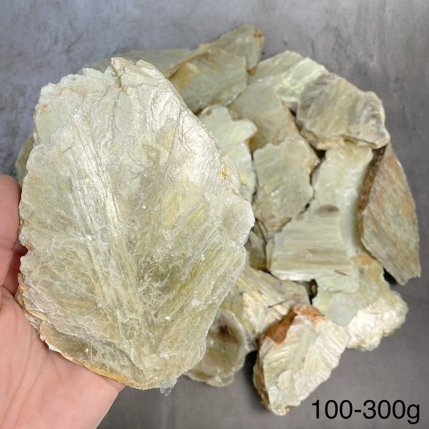 large piece of mica in a hand