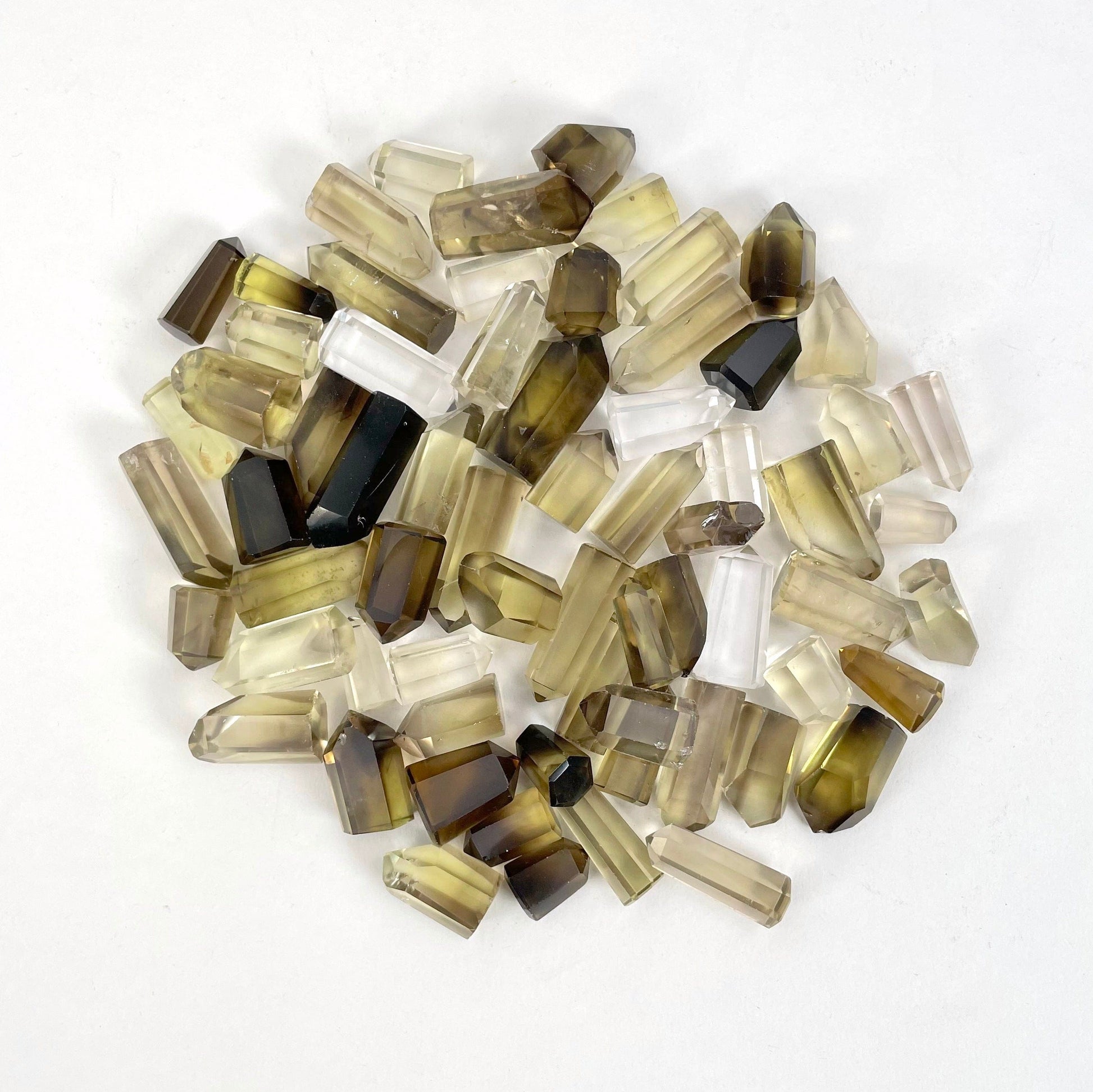 Natural Citrine Points on a white background.