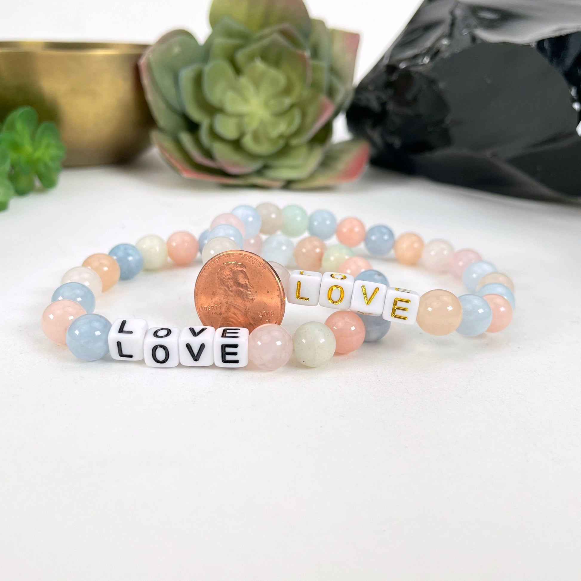 morganite beaded bracelets with penny for size reference