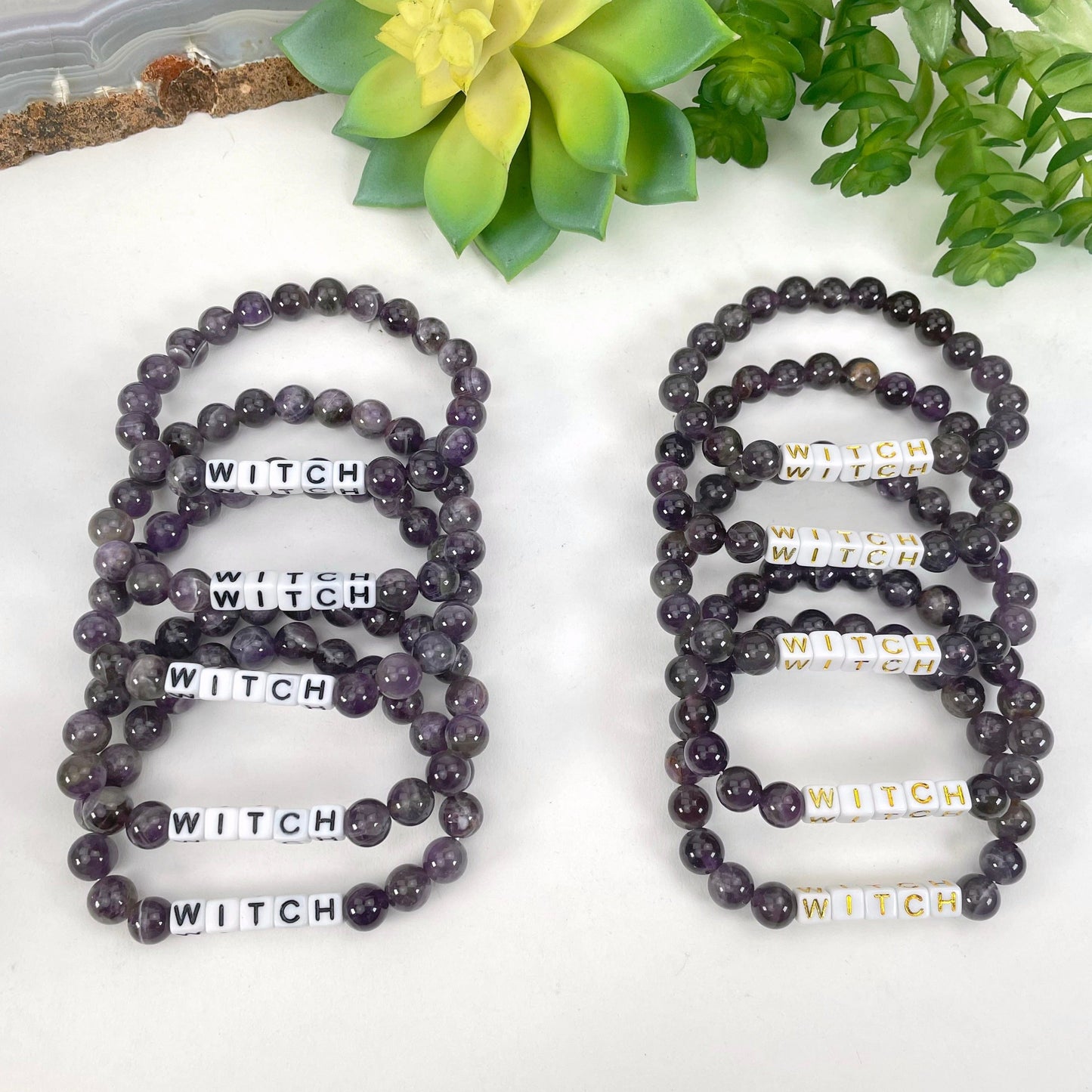 black "WITCH" letter bead option on right display and gold "WITCH" letter bead option on left display