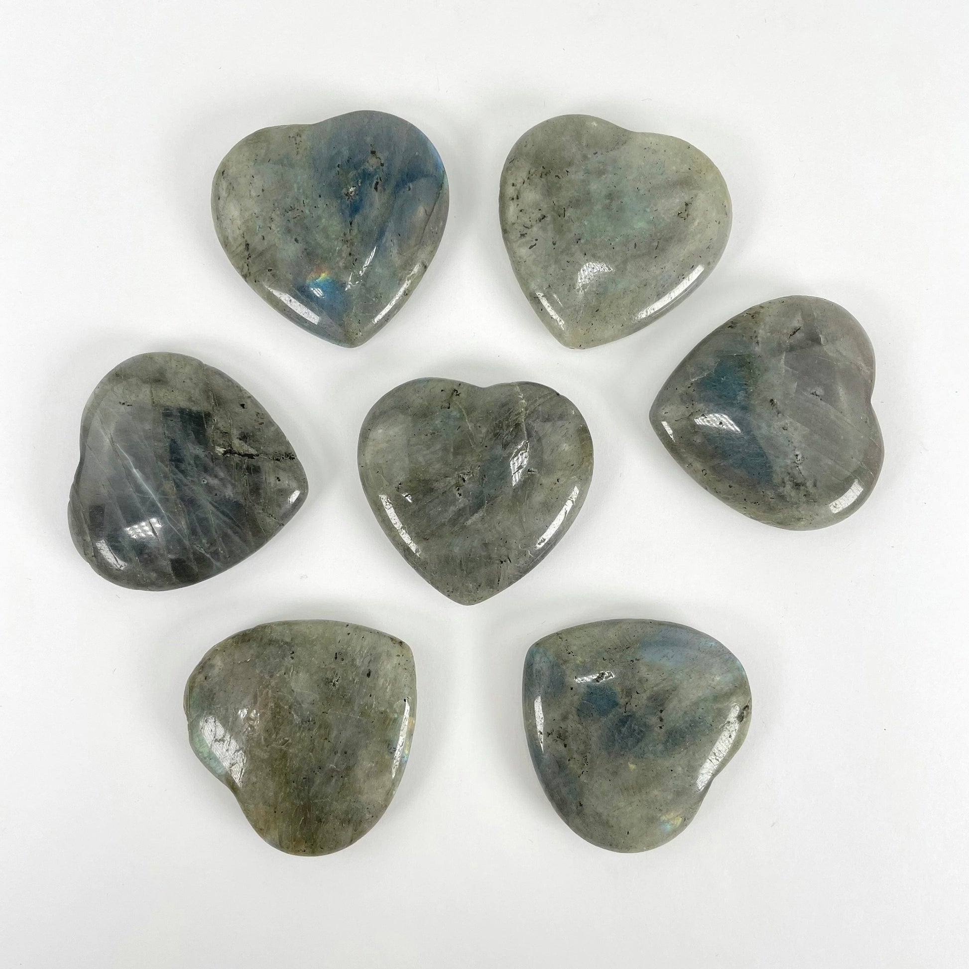labradorite polished hearts laying flat on display