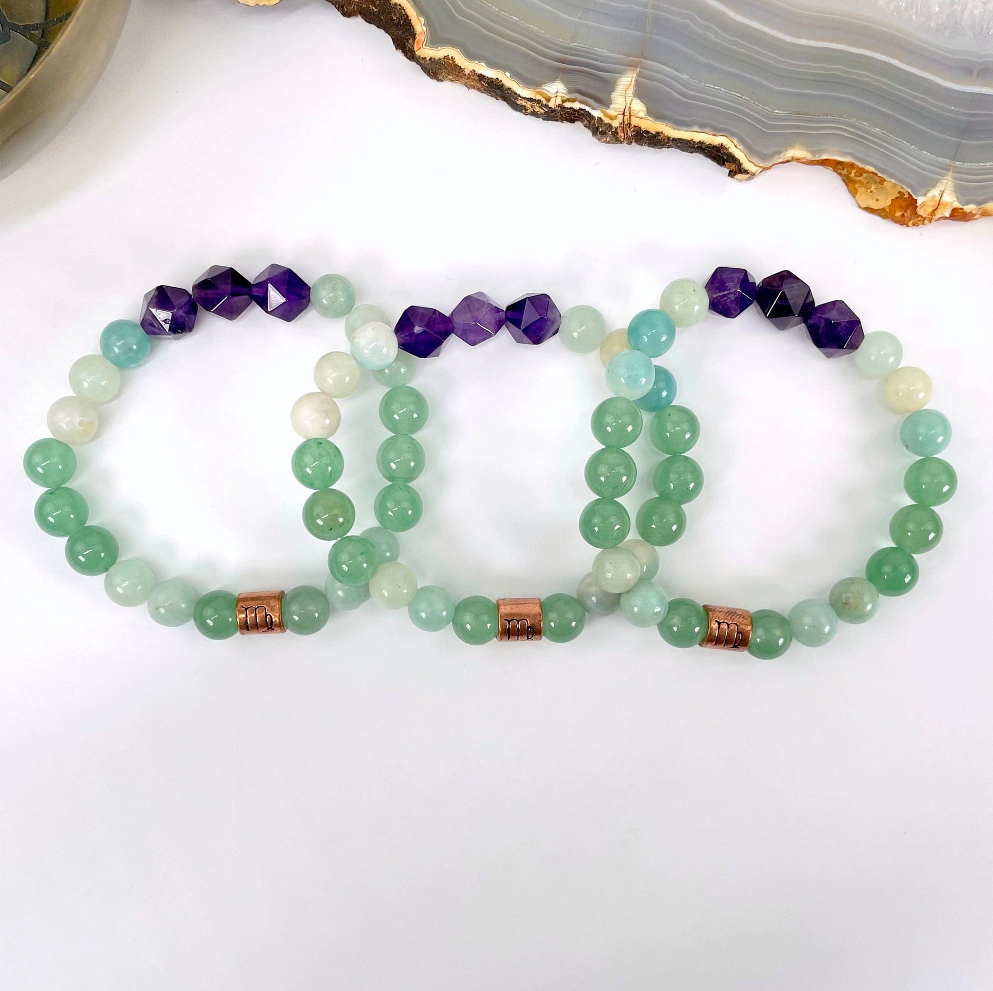 close up of virgo zodiac bracelets for details and possible variations 