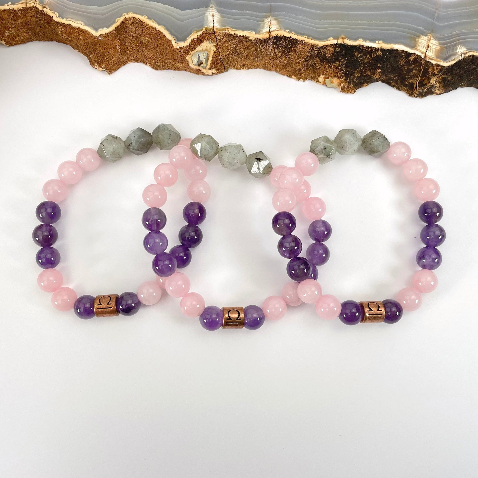 close up of libra zodiac bracelets for details and possible variations 