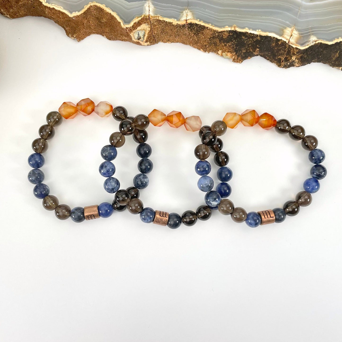 close up of scorpio zodiac bracelets for details and possible variations 