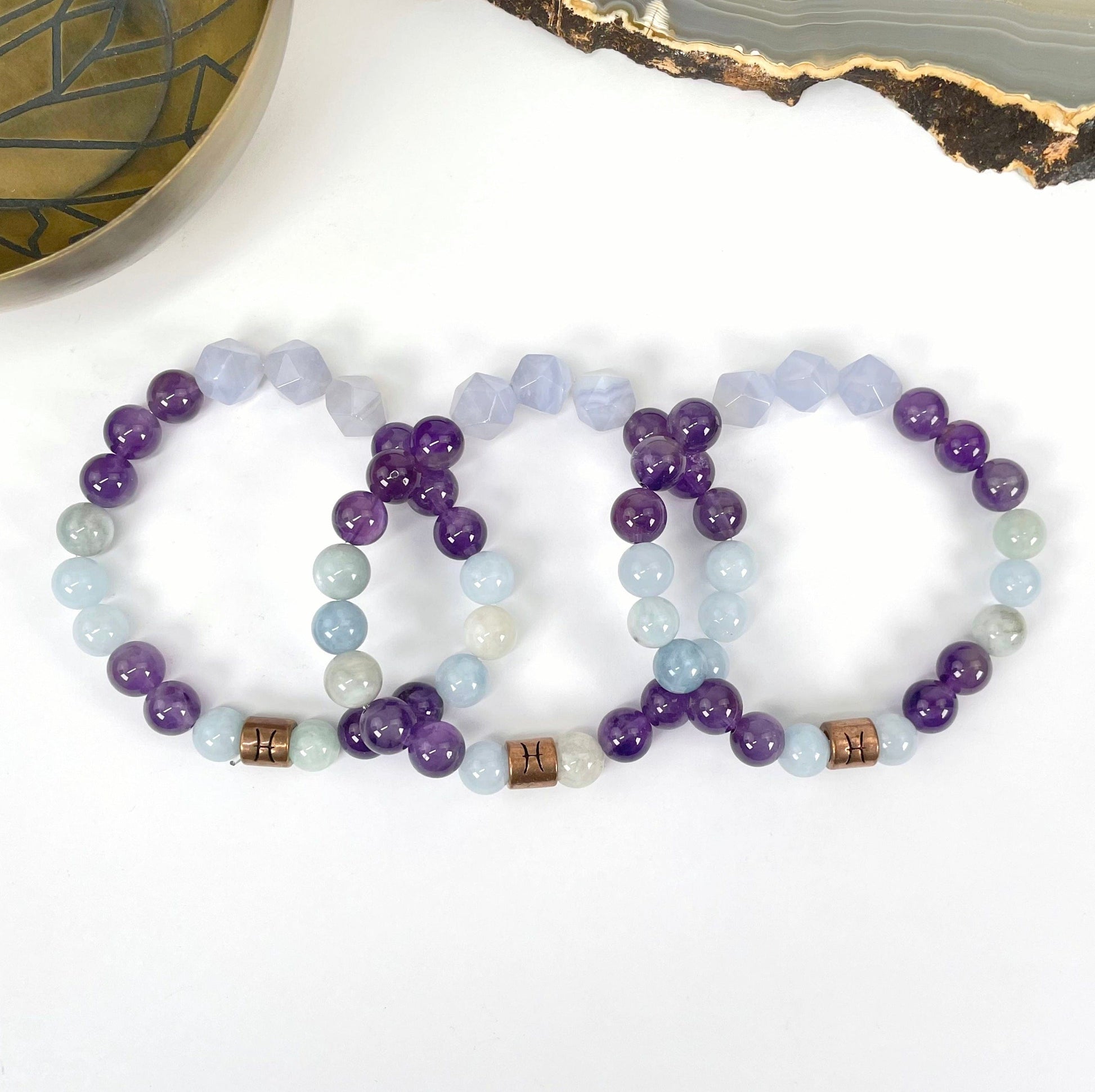 close up of pisces zodiac bracelets for details and possible variations 