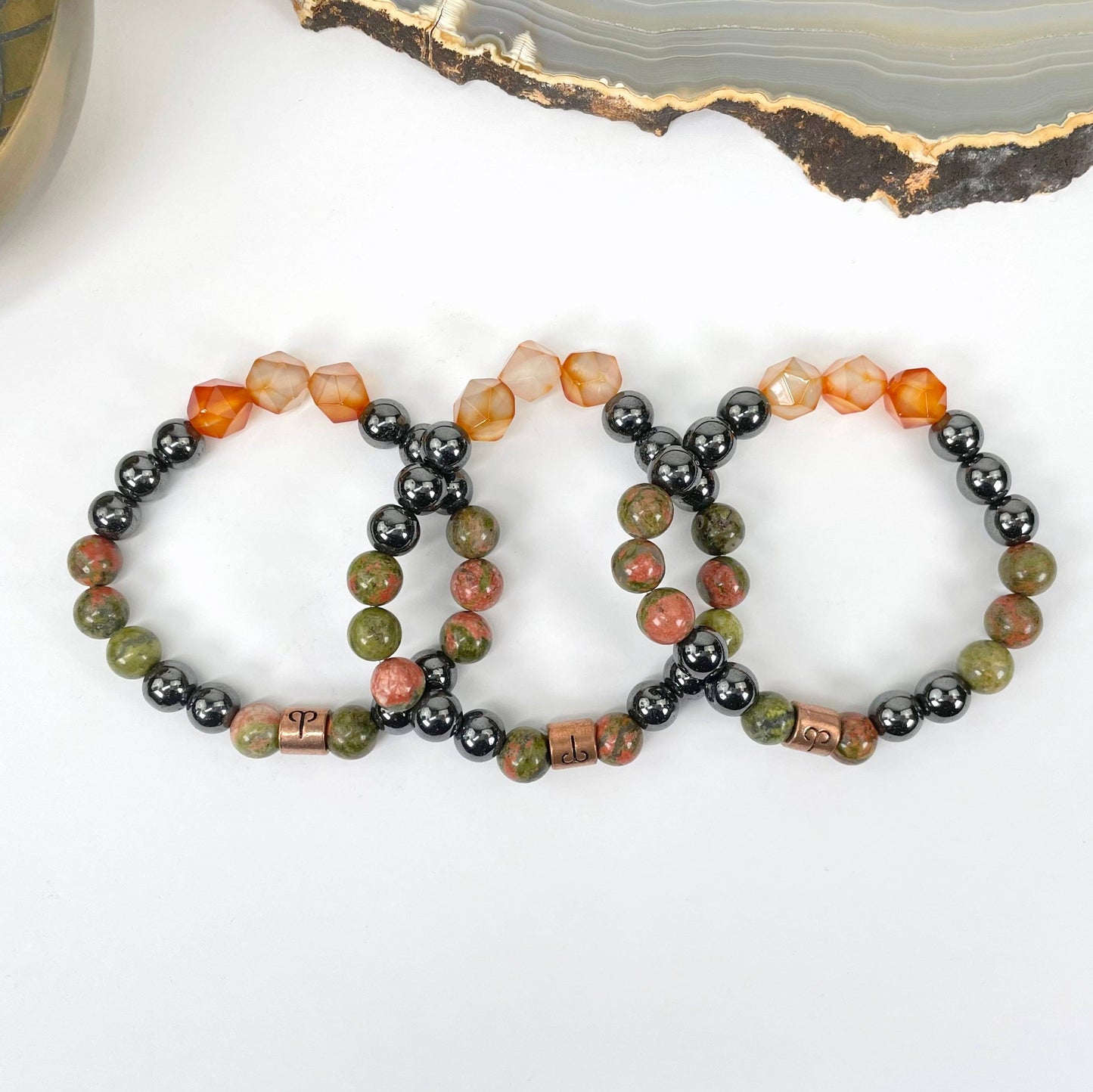 close up of aries zodiac bracelets for details and possible variations 