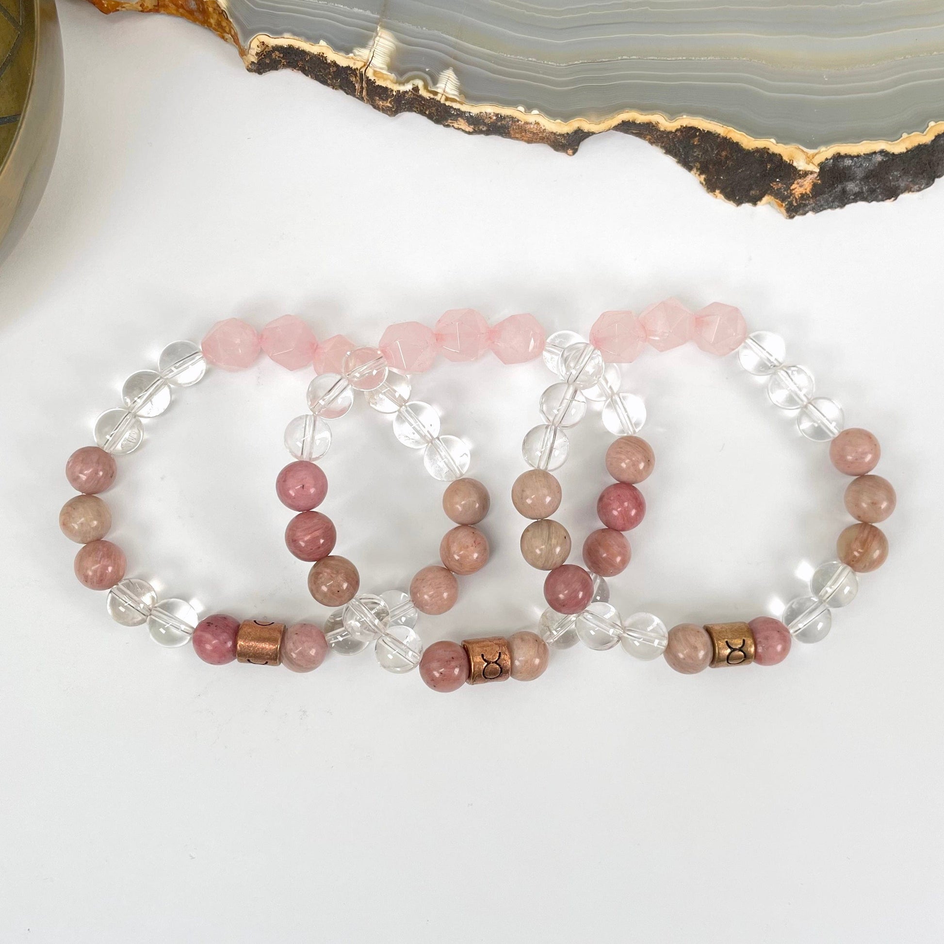 close up of taurus zodiac bracelets for details and possible variations 