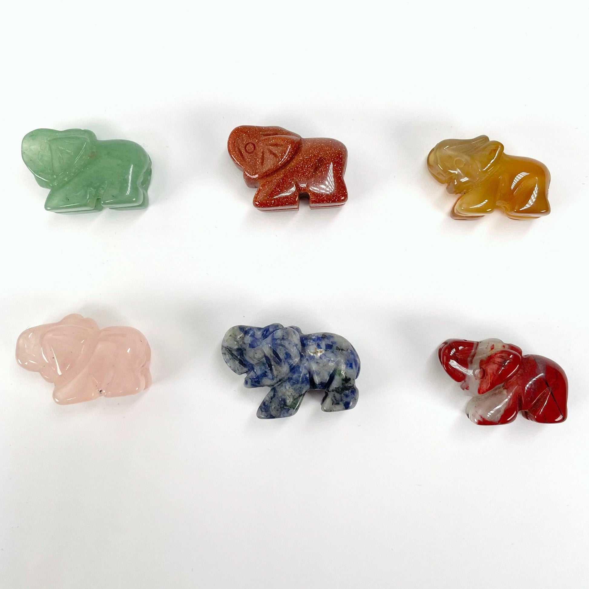 all gemstone elephant options laying flat on display