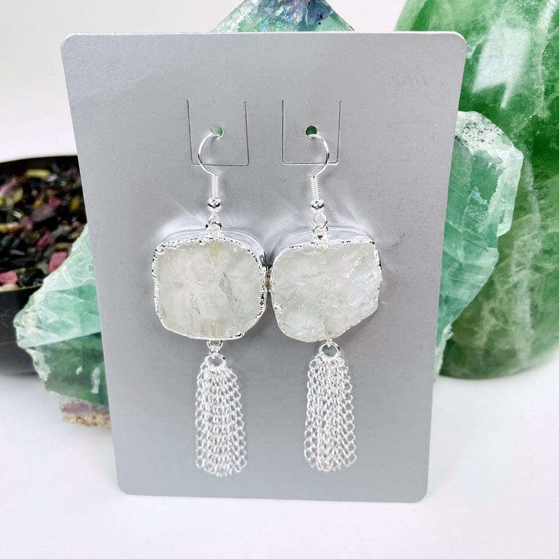 close up of the details on the silver earrings 
