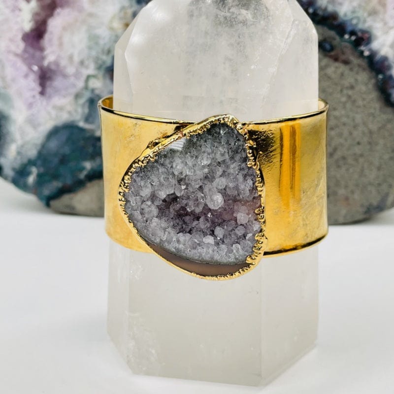 close up of the details on an amethyst cuff bracelet 
