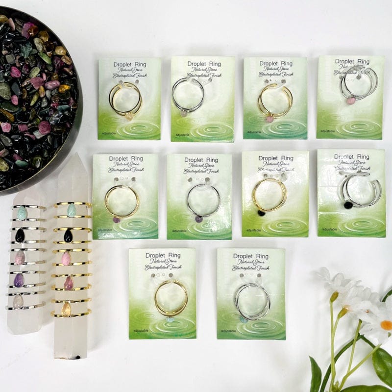 multiple rings displayed to show the differences in the gemstone type