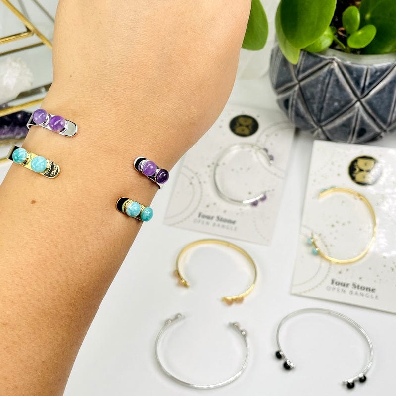 close up of some bracelets on wrist for size reference 