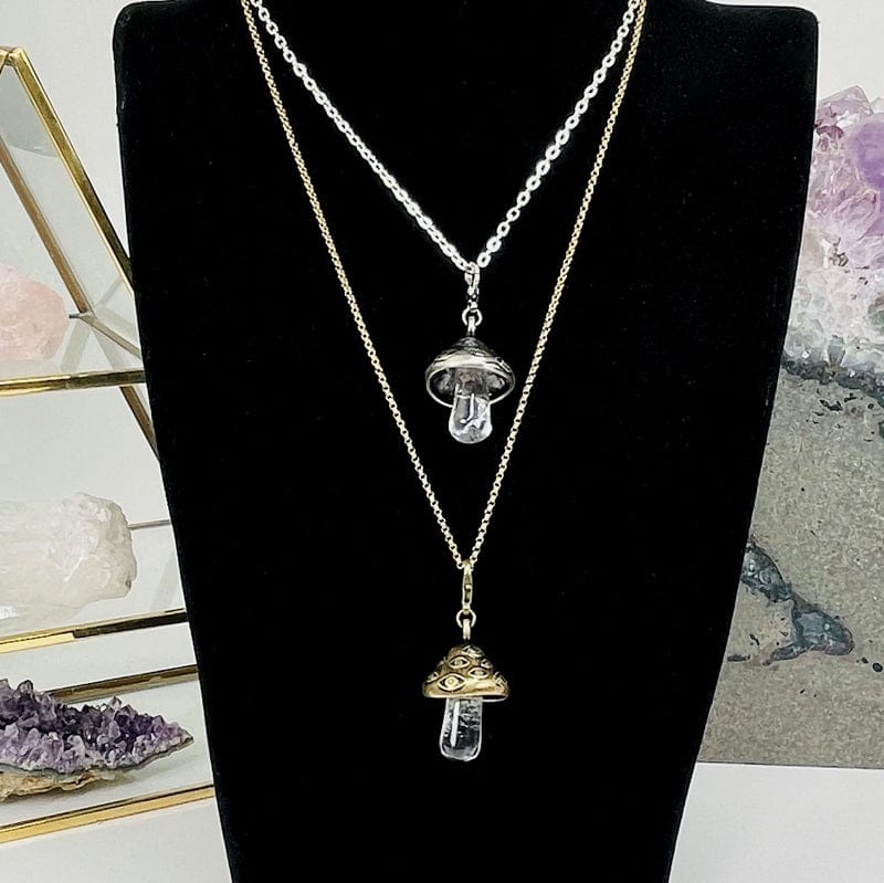 pendants displayed on necklaces 