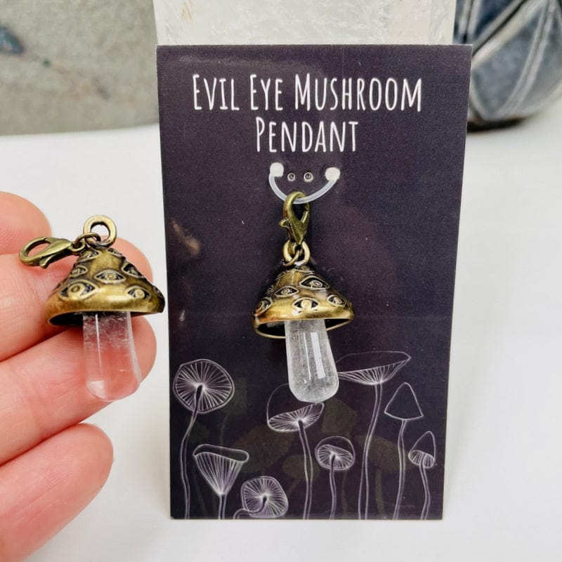 antique gold pendant in hand for size reference 