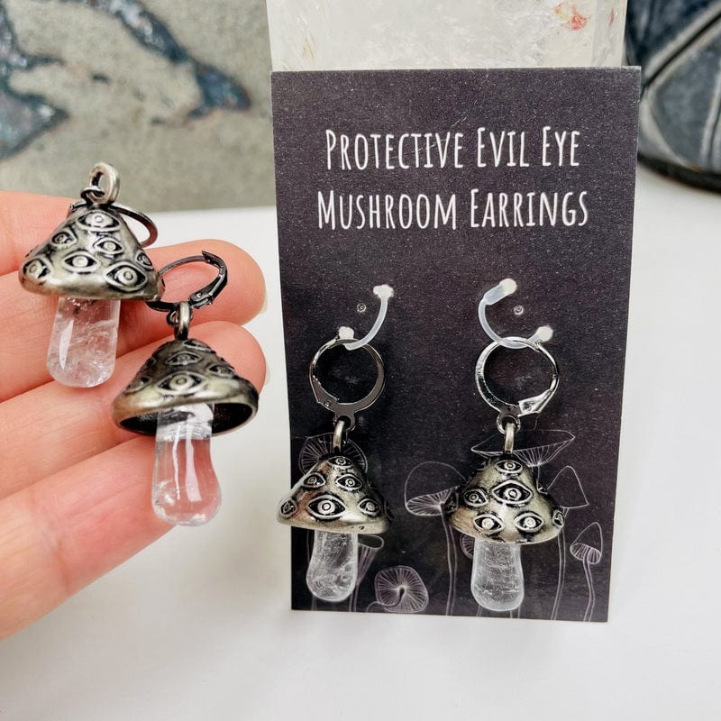 close up of the antique silver evil eye mushroom earrings