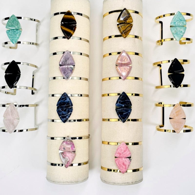 cuff bracelets displayed to show that they come in electroplated gold and silver 
