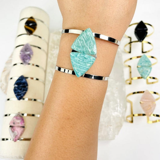 double triangle cuff bracelet on wrist for size reference 