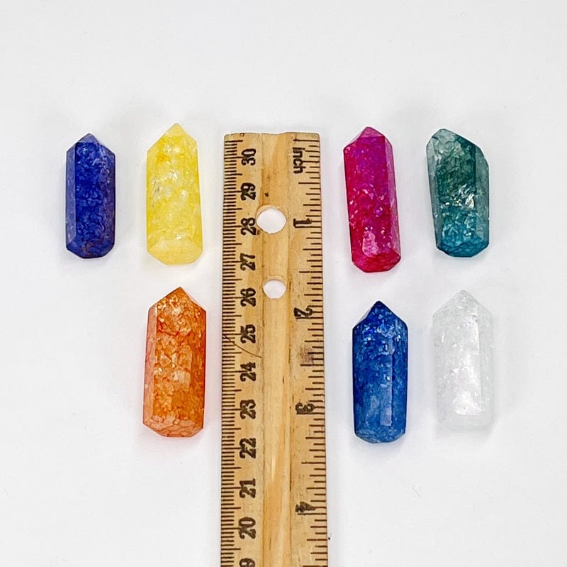 pencil points next to a rule for size reference 