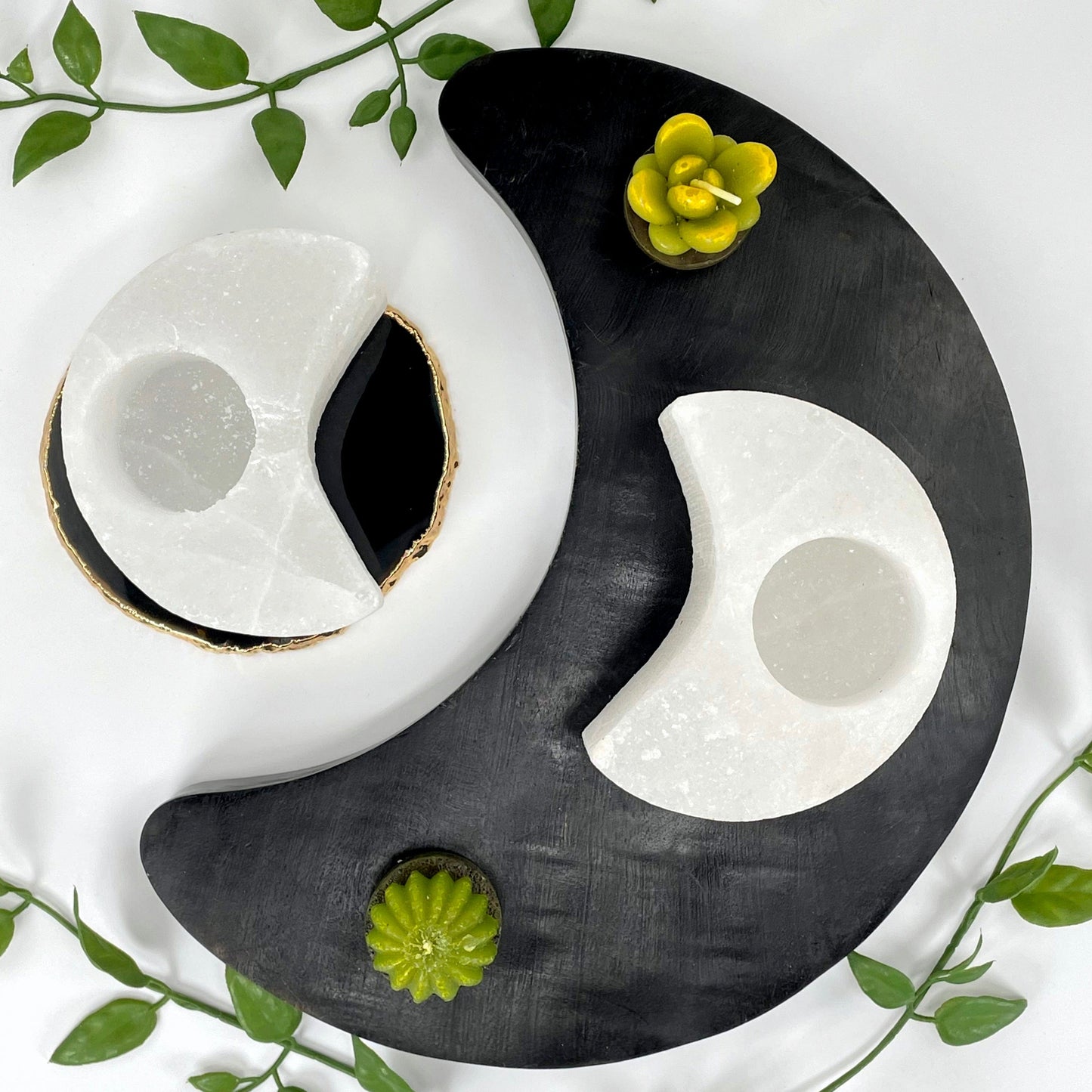 overhead view of two himalayan salt white moon candle holders on display