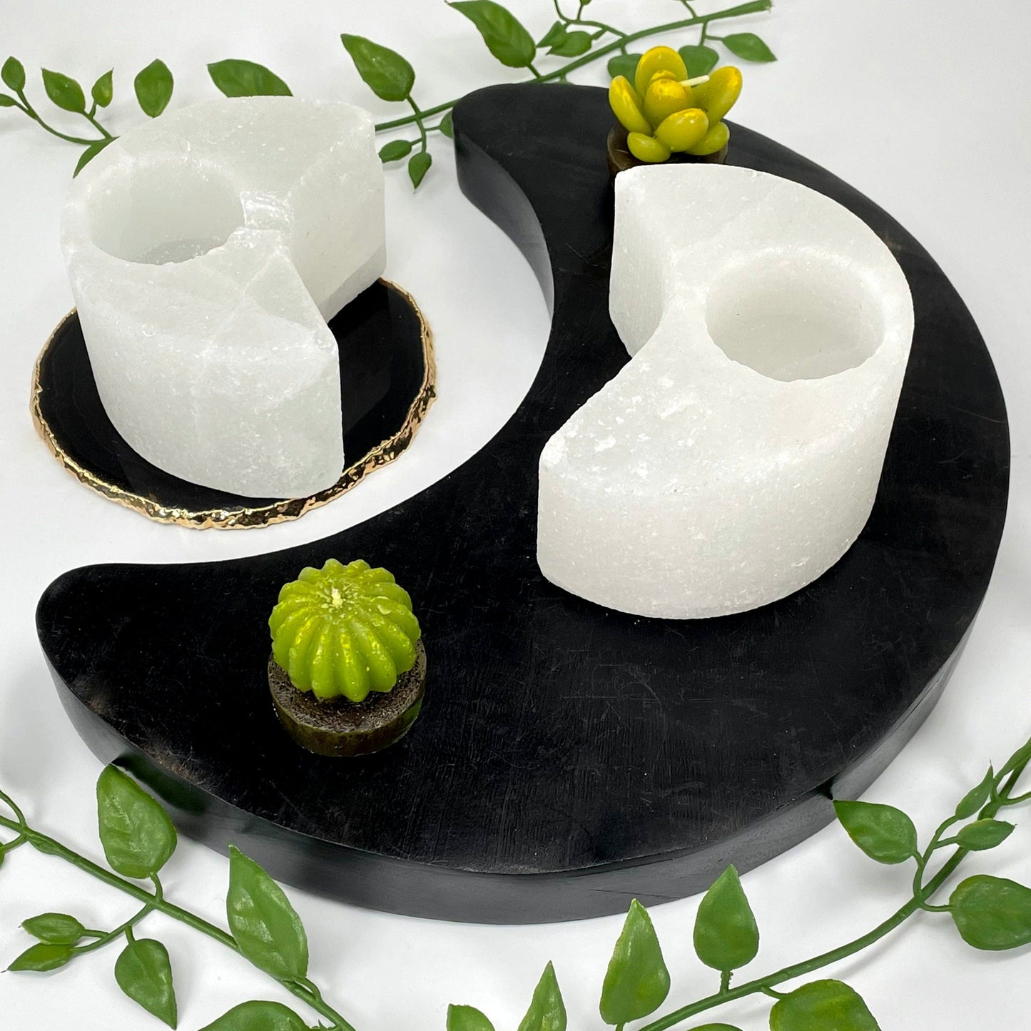 angled view of two himalayan salt white moon candle holders