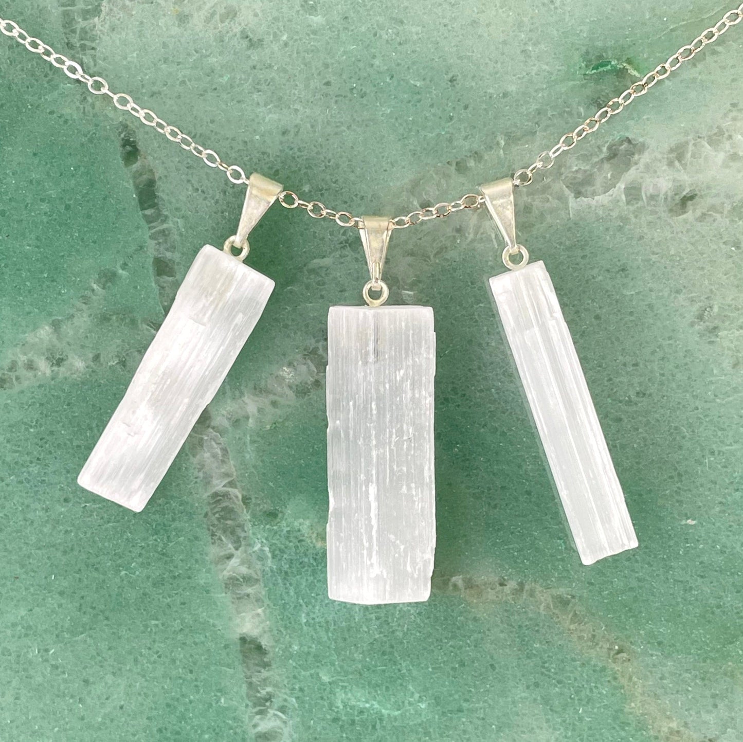 three selenite rough pendants on chain