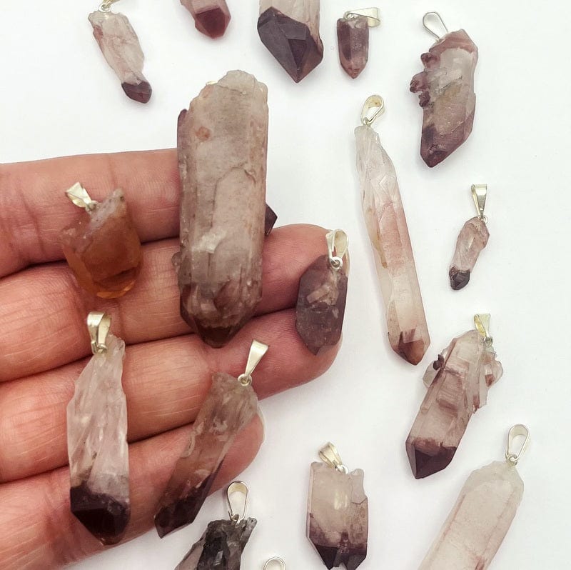 point pendants in hand for size reference 