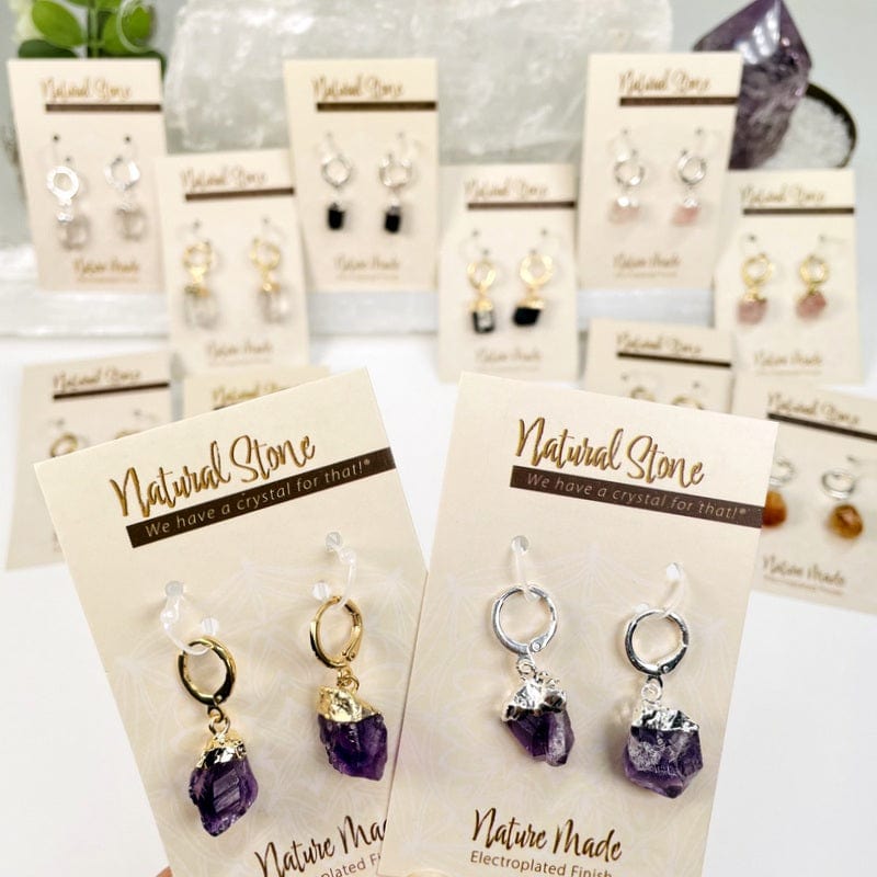 multiple earrings displayed  to show all of the variations in silver and gold 