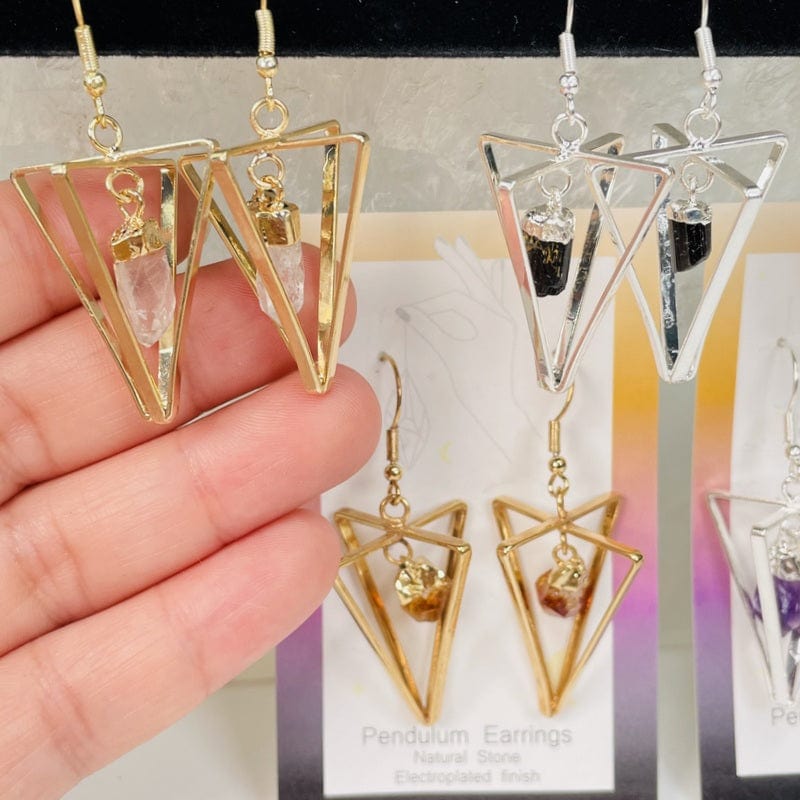 earrings in hand for size reference 