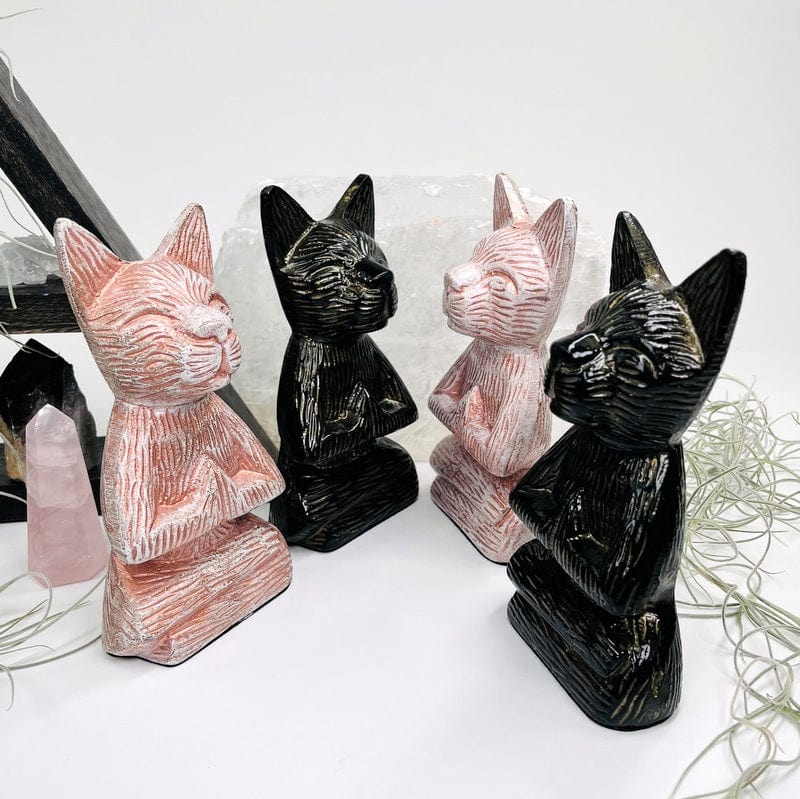 buddha cats displayed in different angles 