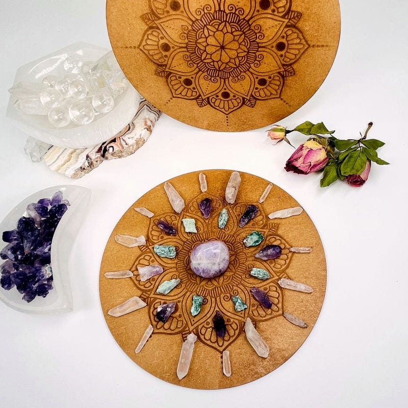 wooden grid with engraved mandala displayed as home decor 