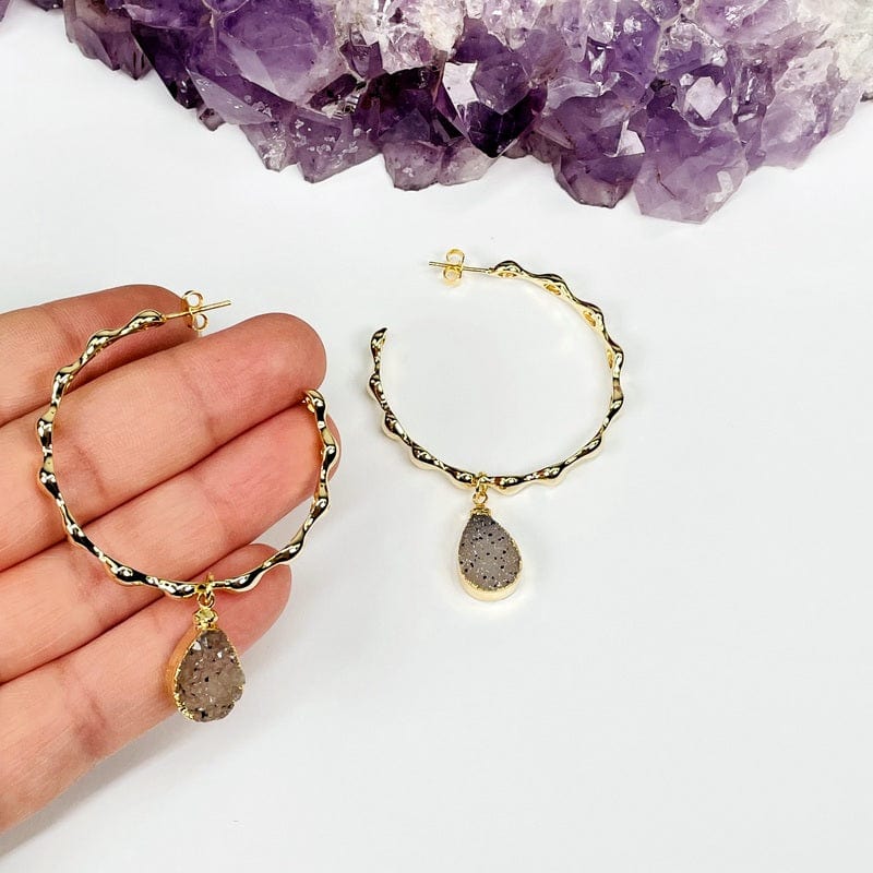 earrings hoop in hand for size reference 